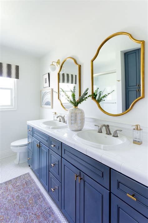 bathroom with gold accents.